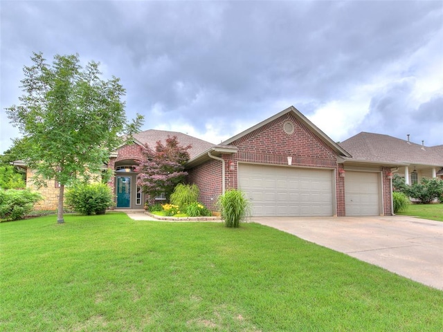 113 Stone Creek Dr, Midwest City, OK 73130 - view of front facade with an attached garage, brick siding, driveway, a front yard, and a shingled roof