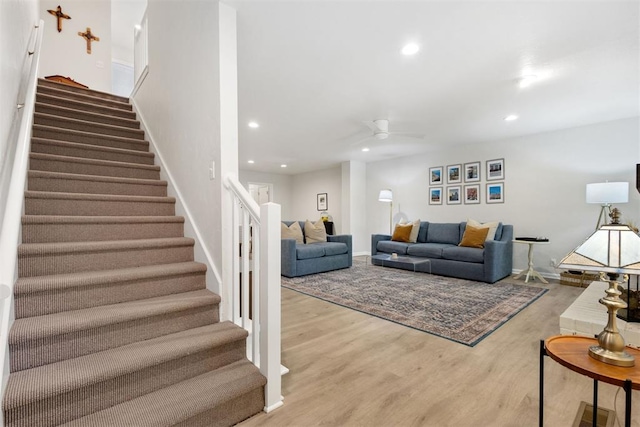7802 Old Hickory Ln, Oklahoma City, OK 73116 - living room featuring stairway, recessed lighting, a ceiling fan, wood finished floors, and baseboards