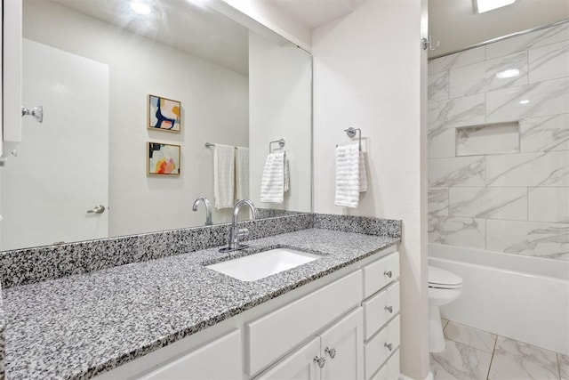 7802 Old Hickory Ln, Oklahoma City, OK 73116 - full bathroom with marble look tile flooring, vanity, toilet, and shower / washtub combination