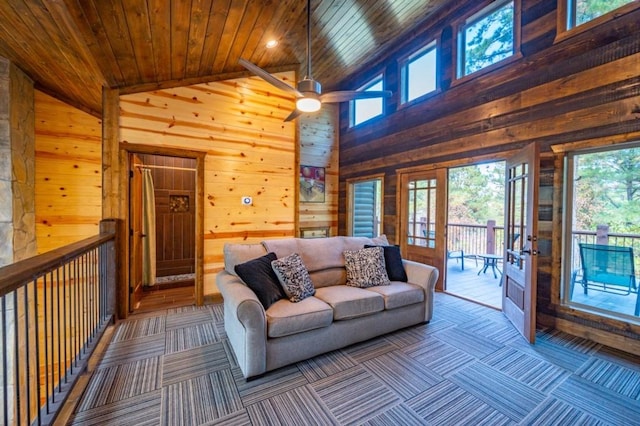 59 Sweet Elm, Broken Bow, OK 74728 - living room featuring french doors, wood walls, wood ceiling, ceiling fan, and high vaulted ceiling