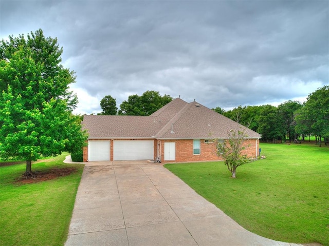 16441 Roserock Cir, Choctaw, OK 73020 - view of front of house with a garage, driveway, a front lawn, roof with shingles, and brick siding