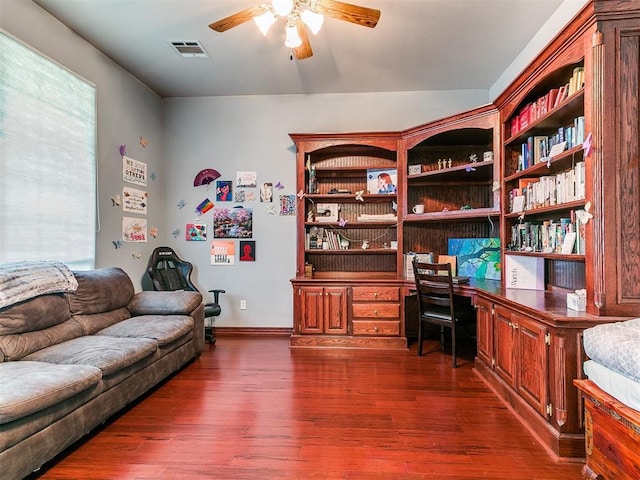16441 Roserock Cir, Choctaw, OK 73020 - office with ceiling fan, dark wood finished floors, baseboards, and built in study area