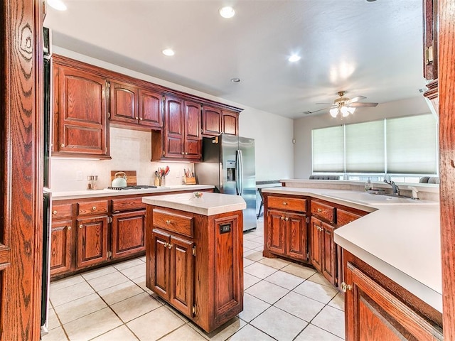 16441 Roserock Cir, Choctaw, OK 73020 - kitchen featuring a sink, stainless steel refrigerator with ice dispenser, light countertops, light tile patterned flooring, and recessed lighting