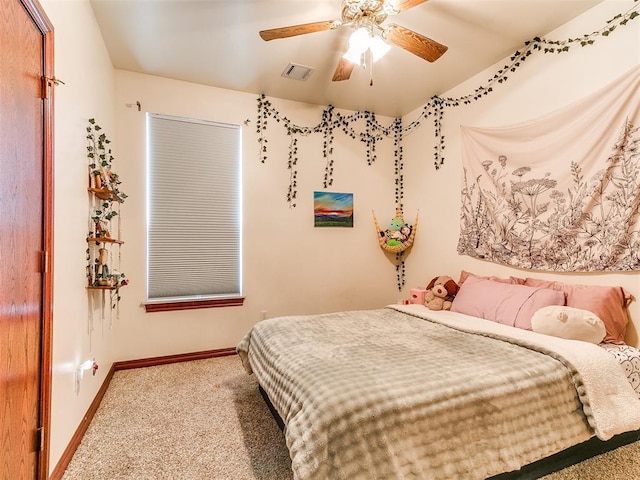 16441 Roserock Cir, Choctaw, OK 73020 - carpeted bedroom with baseboards and a ceiling fan