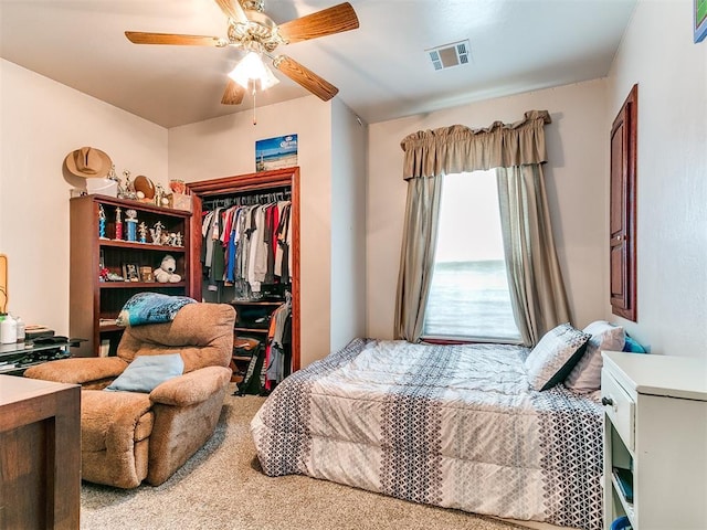 16441 Roserock Cir, Choctaw, OK 73020 - bedroom with a closet, carpet floors, and a ceiling fan
