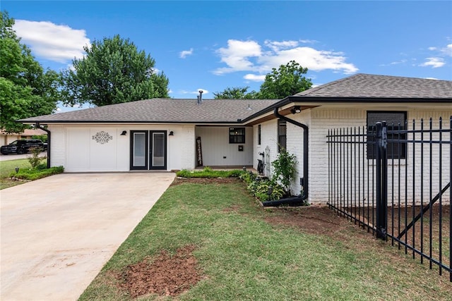 1113 Winnipeg Dr, Yukon, OK 73099 - ranch-style house featuring brick siding, concrete driveway, and roof with shingles