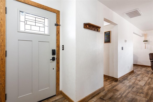 1113 Winnipeg Dr, Yukon, OK 73099 - entryway with wood finished floors and baseboards