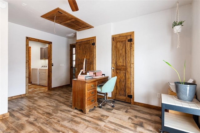 1113 Winnipeg Dr, Yukon, OK 73099 - office space featuring attic access, light wood-type flooring, baseboards, and washer and dryer