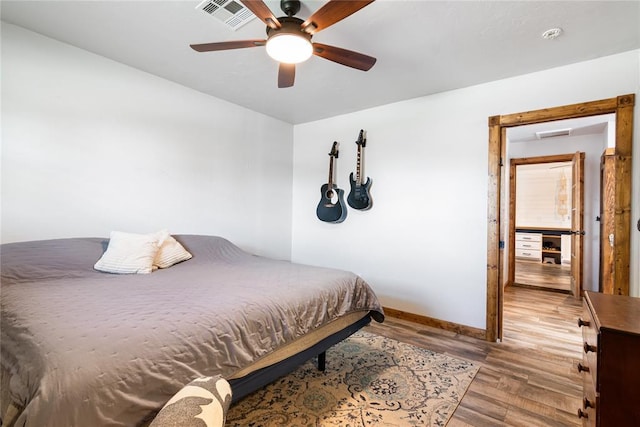 1113 Winnipeg Dr, Yukon, OK 73099 - bedroom featuring light wood-style floors, baseboards, and a ceiling fan