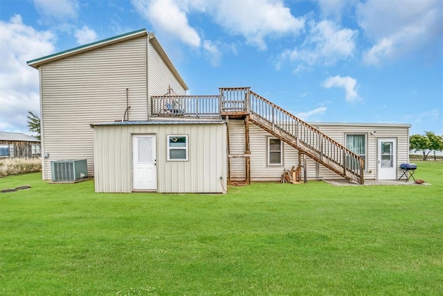 23596 Beach Haven Dr, Granite, OK 73547 - rear view of house with stairway, central air condition unit, and a lawn