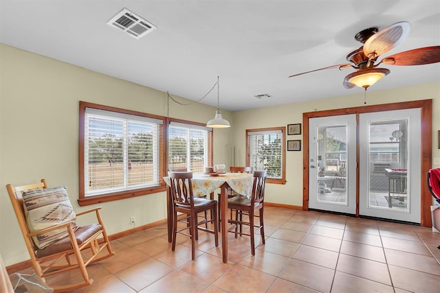 23596 Beach Haven Dr, Granite, OK 73547 - dining area featuring baseboards, light tile patterned flooring, and ceiling fan