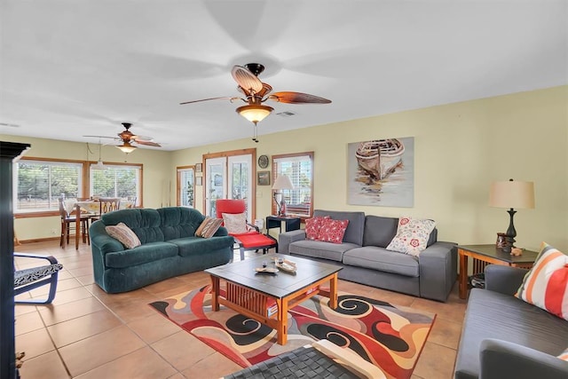 23596 Beach Haven Dr, Granite, OK 73547 - living area with ceiling fan, light tile patterned flooring, and baseboards
