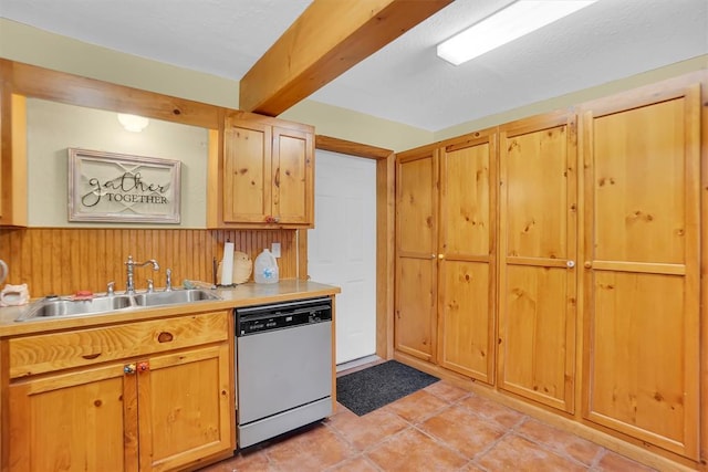 23596 Beach Haven Dr, Granite, OK 73547 - kitchen with dishwasher, a sink, light countertops, and wood walls