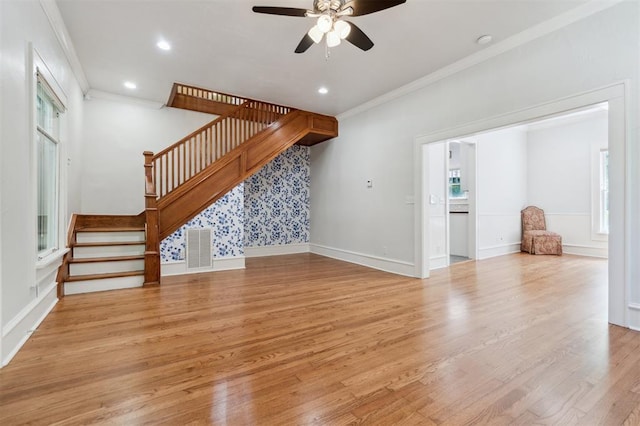 430 W Symmes St, Norman, OK 73069 - unfurnished living room featuring ornamental molding, stairs, ceiling fan, light wood finished floors, and recessed lighting