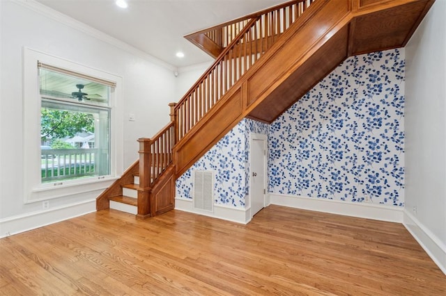 430 W Symmes St, Norman, OK 73069 - stairway featuring wood finished floors, crown molding, recessed lighting, and baseboards