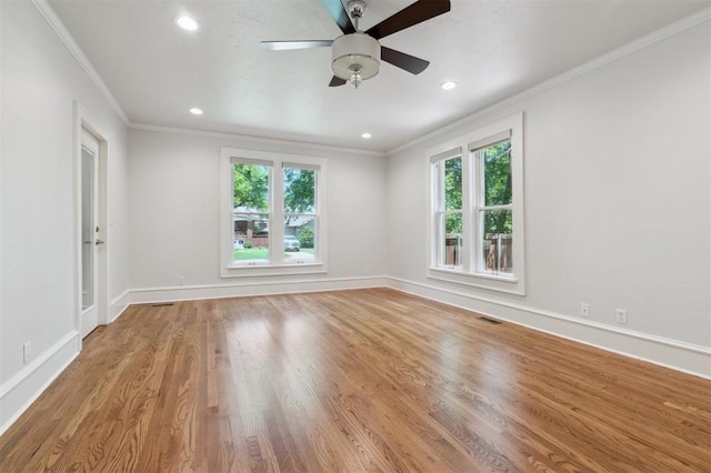 430 W Symmes St, Norman, OK 73069 - unfurnished room with ornamental molding, ceiling fan, recessed lighting, baseboards, and wood finished floors