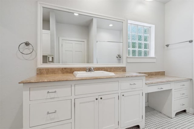 430 W Symmes St, Norman, OK 73069 - bathroom with vanity and tile patterned floors