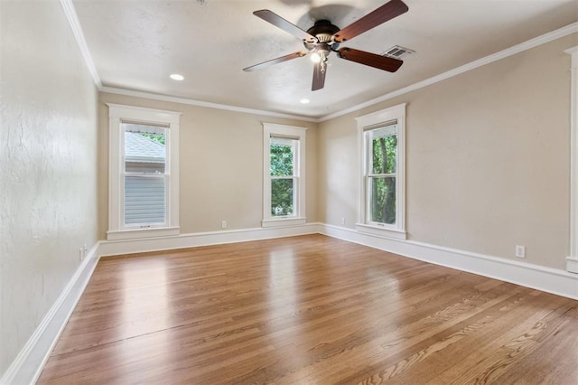 430 W Symmes St, Norman, OK 73069 - empty room featuring wood finished floors, crown molding, a ceiling fan, baseboards, and recessed lighting