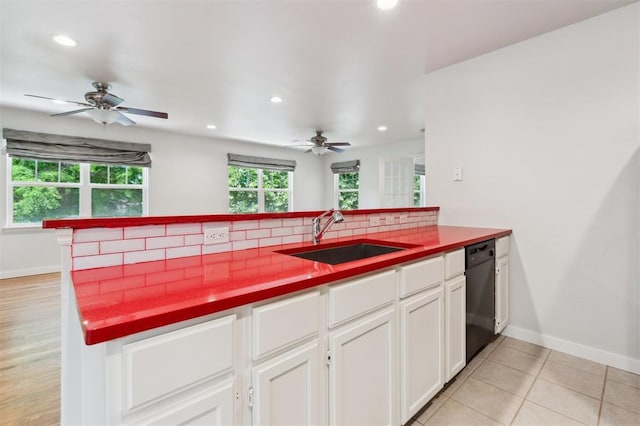 430 W Symmes St, Norman, OK 73069 - kitchen with a sink, black dishwasher, baseboards, recessed lighting, and a ceiling fan