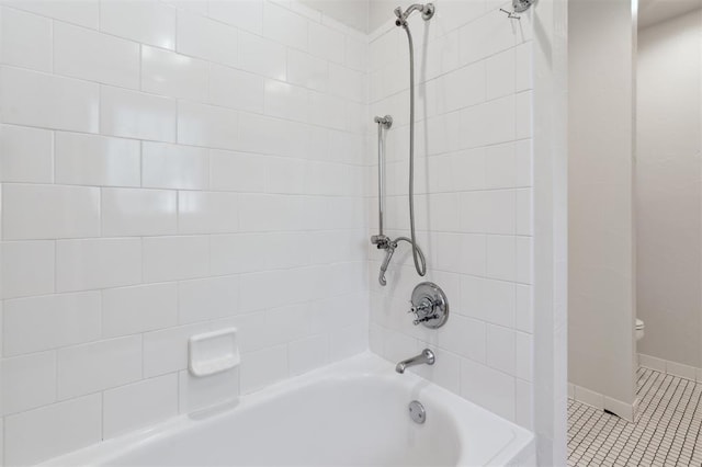 430 W Symmes St, Norman, OK 73069 - full bath with  shower combination, toilet, tile patterned floors, and baseboards