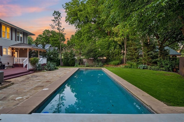 430 W Symmes St, Norman, OK 73069 - view of pool featuring a wooden deck, a patio, and cooling unit