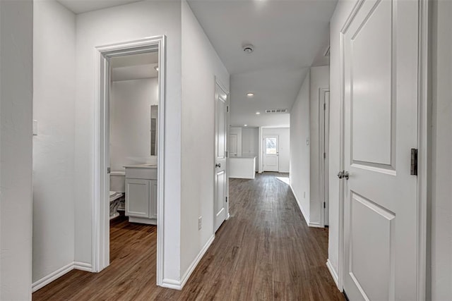 3717 Palmetto Bluff Dr, Mustang, OK 73064 - hallway featuring dark wood finished floors and baseboards