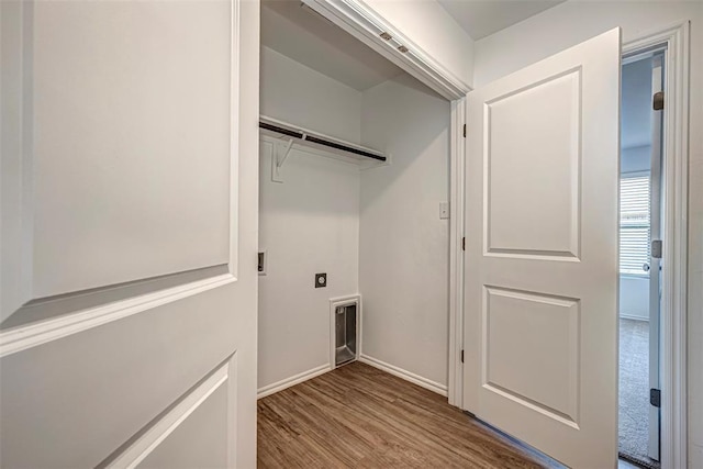 3717 Palmetto Bluff Dr, Mustang, OK 73064 - washroom with hookup for an electric dryer, baseboards, and wood finished floors