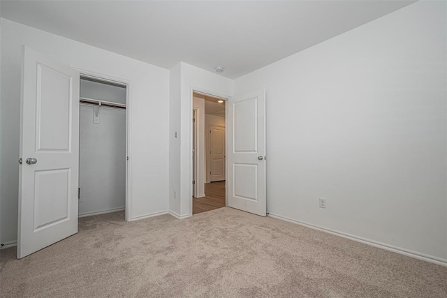 3717 Palmetto Bluff Dr, Mustang, OK 73064 - unfurnished bedroom with carpet flooring, a closet, and baseboards