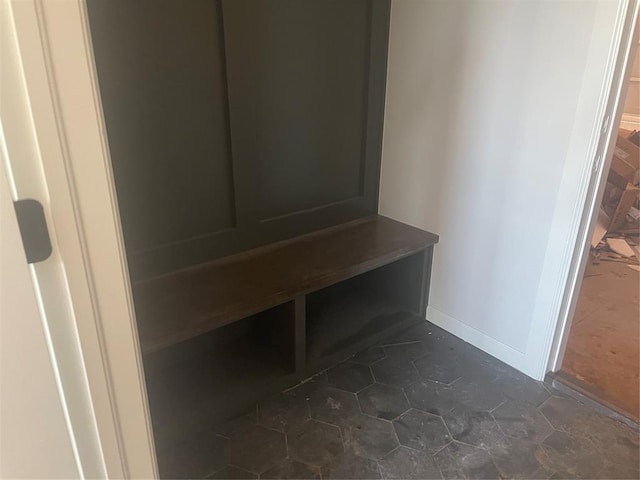 5100 Misty Wood Ln, Mustang, OK 73064 - mudroom with dark tile patterned flooring and baseboards