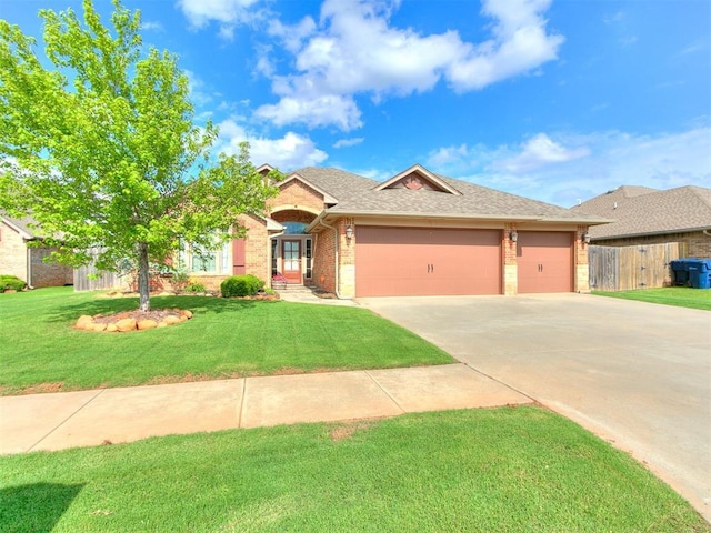 15508 Homecoming Dr, Edmond, OK 73013 - ranch-style house featuring brick siding, a garage, concrete driveway, and roof with shingles