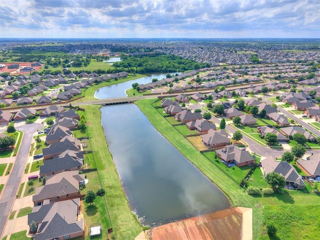 15508 Homecoming Dr, Edmond, OK 73013 - aerial overview of property's location featuring a large body of water and nearby suburban area