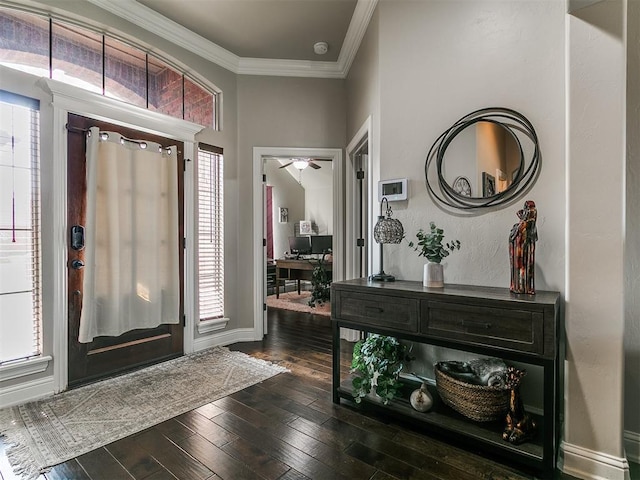 15508 Homecoming Dr, Edmond, OK 73013 - entryway featuring plenty of natural light, dark wood-style floors, ornamental molding, ceiling fan, and baseboards