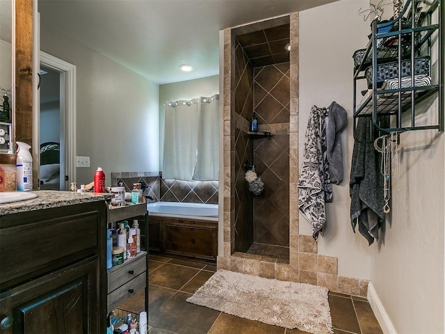 15508 Homecoming Dr, Edmond, OK 73013 - full bathroom featuring a garden tub, vanity, tiled shower, tile patterned floors, and ensuite bathroom