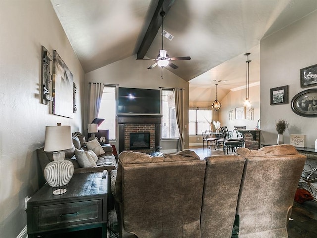 15508 Homecoming Dr, Edmond, OK 73013 - living area featuring a brick fireplace, a ceiling fan, and baseboards