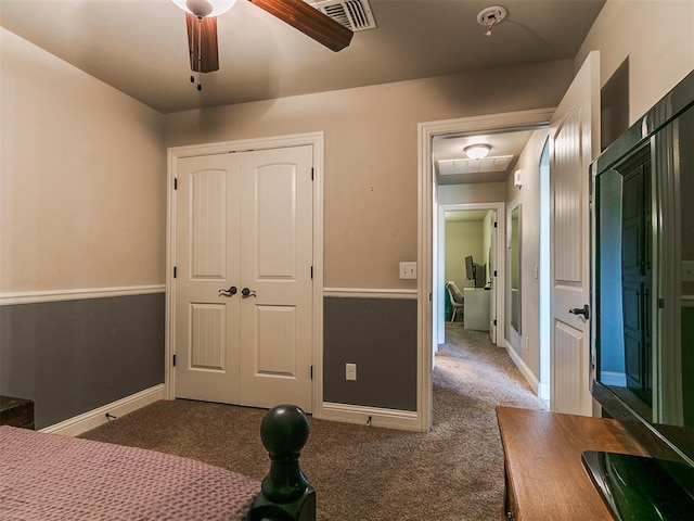 15508 Homecoming Dr, Edmond, OK 73013 - bedroom with carpet flooring, a closet, ceiling fan, baseboards, and attic access