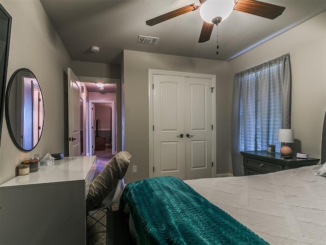 15508 Homecoming Dr, Edmond, OK 73013 - bedroom featuring a closet and a ceiling fan