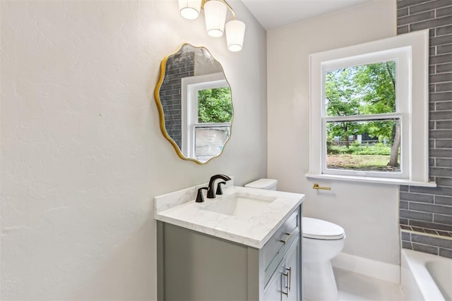 938 NE 21st St, Oklahoma City, OK 73105 - bathroom with vanity, healthy amount of natural light, toilet, and a bath