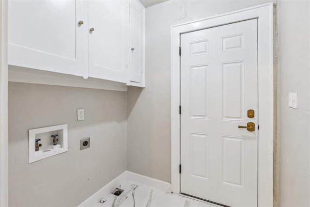 938 NE 21st St, Oklahoma City, OK 73105 - laundry room featuring electric dryer hookup, cabinet space, hookup for a washing machine, baseboards, and light marble finish flooring