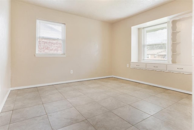 1221 NW 101st St, Oklahoma City, OK 73114 - unfurnished room featuring baseboards and tile patterned floors