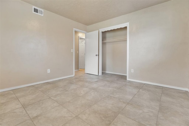 1221 NW 101st St, Oklahoma City, OK 73114 - unfurnished bedroom featuring baseboards and a closet