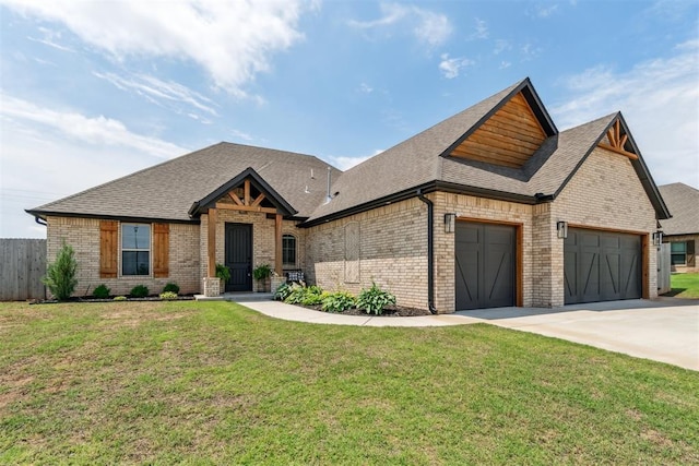 4442 Violet St, Tuttle, OK 73089 - view of front of home with brick siding, concrete driveway, roof with shingles, and an attached garage