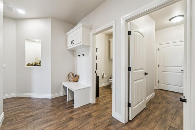 4442 Violet St, Tuttle, OK 73089 - hallway with dark wood-type flooring and baseboards