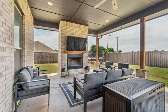 4442 Violet St, Tuttle, OK 73089 - fenced backyard with an outdoor living space with a fireplace and a patio