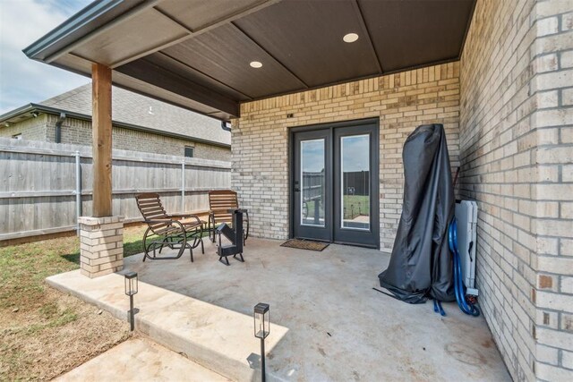 4442 Violet St, Tuttle, OK 73089 - view of patio / terrace featuring french doors