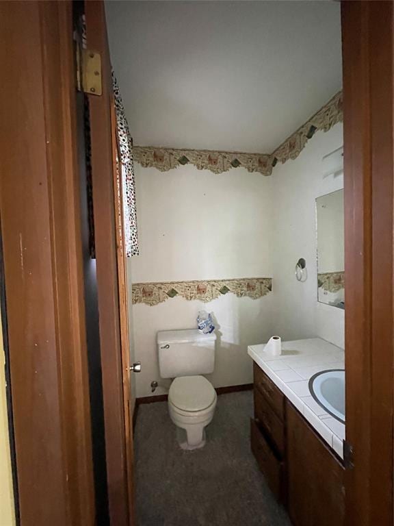 403 NW 3rd St, Minco, OK 73059 - half bathroom with vanity and toilet