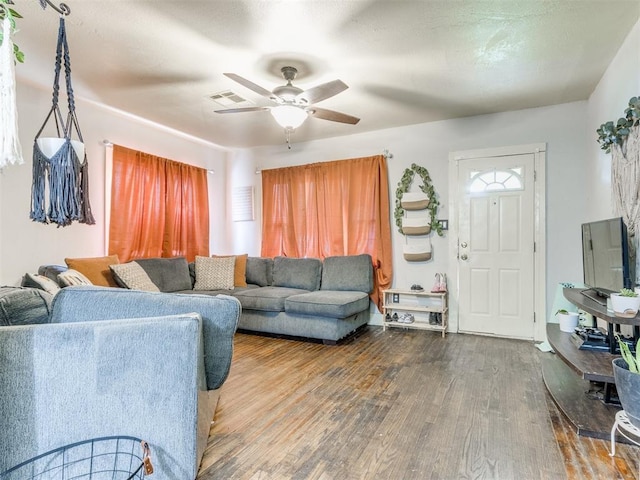 2133 SW 46th St, Oklahoma City, OK 73119 - living area with wood finished floors and ceiling fan