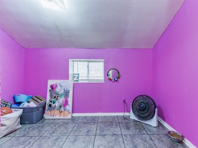 2133 SW 46th St, Oklahoma City, OK 73119 - recreation room featuring lofted ceiling and baseboards