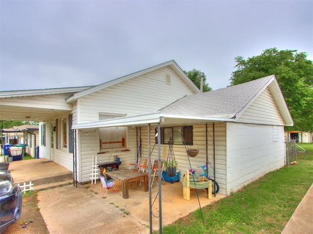 2133 SW 46th St, Oklahoma City, OK 73119 - view of front of property featuring roof with shingles