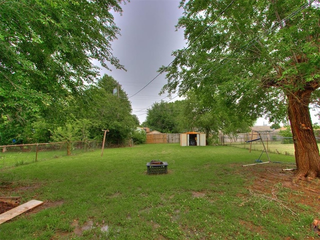2133 SW 46th St, Oklahoma City, OK 73119 - view of yard with an outdoor fire pit