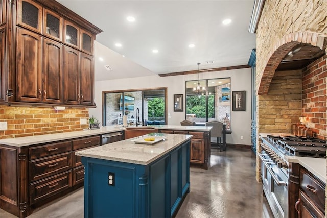 5813 Tiger Stone Dr, Mustang, OK 73064 - kitchen with a sink, a kitchen island, concrete floors, baseboards, and a peninsula